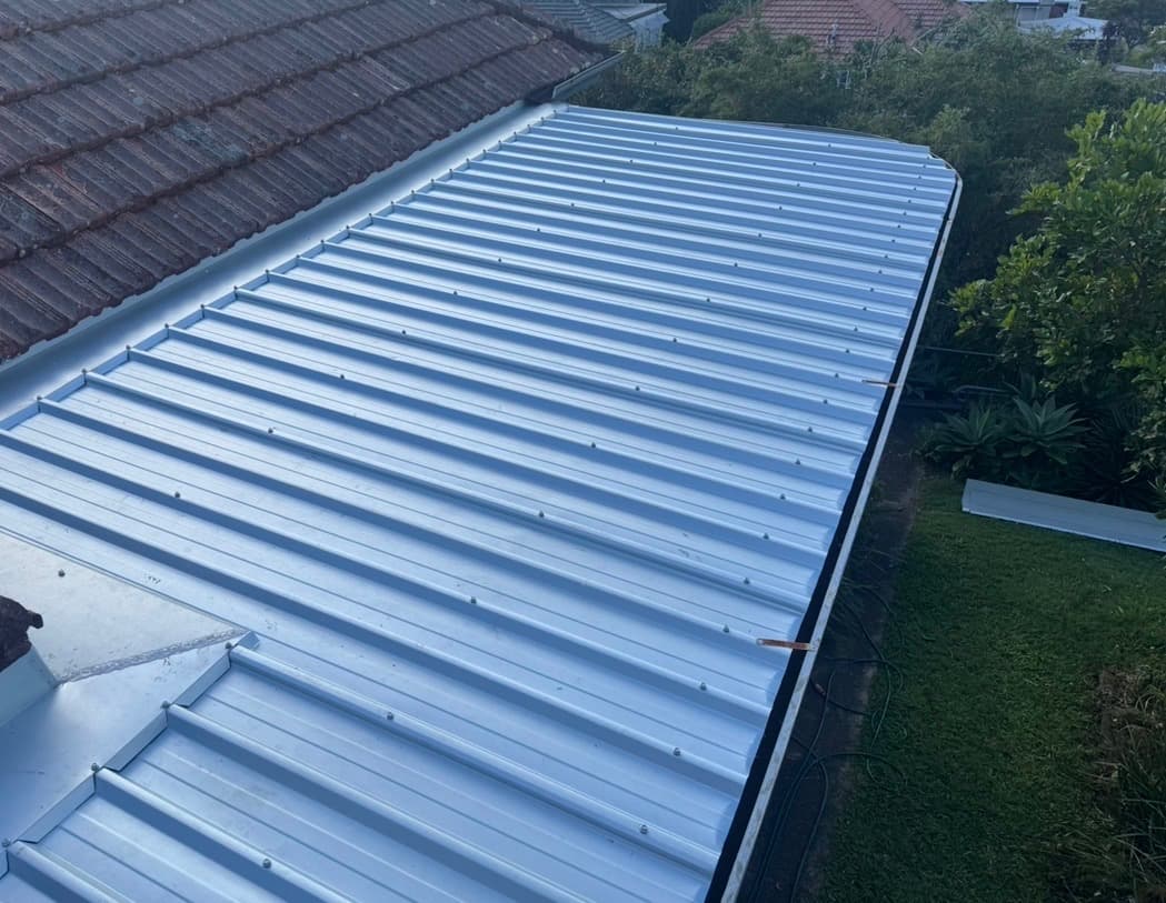 Second roof after restoration - brand new metal sheeting