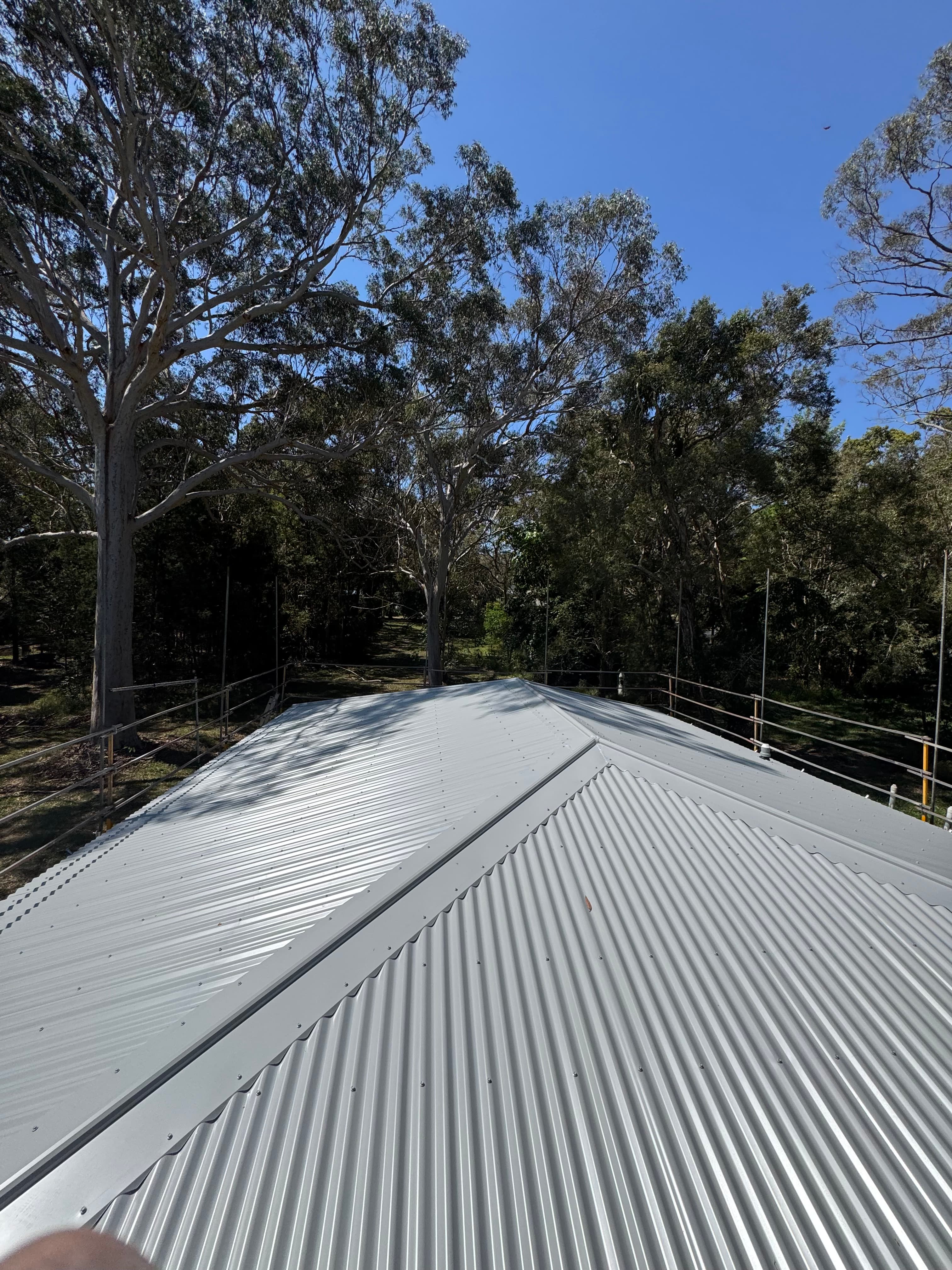 Third roof after restoration - brand new silver sheeting
